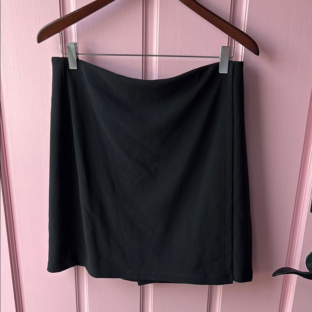 Boston Proper Elegant Black Mini skirt. There is shorts underneath